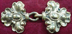 bronze stylized fleur de lis clasp