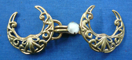 bronze filigree crescent clasp
