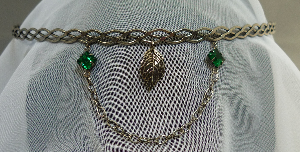 Silver-tone braid band with leaf dangle and chain