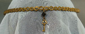 Gold-tone braid with gem and key dangle