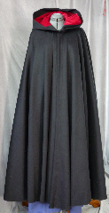 Cloak:1948, Cloak Color:Black, Cloak Style:Full Circle Cloak, Hood Lining:Red Cotton Velveteen, Cloak Clasp:Triple Medallion, Fiber / Weave:Wool / cashmere, Back Length:54", Neck Length:21", Seasons:Winter, Fall, Spring.