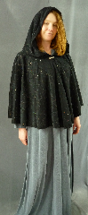 Cloak:1982, Cloak Style:Short Full Circle, Cloak Color:Black flocked with Black and Multi-color glitter, Fiber / Weave:Polyester / Nylon, Cloak Clasp:Fleur de Lis, Hood Lining:Unlined, Back Length:27", Neck Length:25", Seasons:Summer, Note:This short full circle cloak is perfect <br>for adding just a touch of drama and elegance.<br>Made from a flocked polyester with an eyecatching<br> black and multi-coloured glitter overlapping swirl design.<br>Features an oversized hood, unlined.<br>Finished off with a cute Fleur de Lis hook-and-eye clasp.<br>Perfect for Summer, late Spring, early Fall evenings.