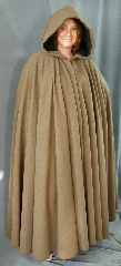 Cloak:1995, Cloak Style:Full Circle Cloak, Cloak Color:Heathered Light Brown with Grey, Fiber / Weave:80% wool 20% nylon, Cloak Clasp:Vale - Goldtone, Hood Lining:Heathered Black cotton velvet, Back Length:54", Neck Length:21", Seasons:Spring, Fall, Note:This full circle cloak is made from a wool/nylon blend in a<br>heathered light brown with a touch of grey that will blend well in the woods<br>and look decent between cleanings.<br>Full hood features heathered grey black cotton velvet lining.<br>
Finished with a gold tone Vale hook-and-eye clasp..