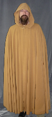 Cloak:2069, Cloak Style:Full Circle Cloak, Cloak Color:Camel, Fiber / Weave:100% Polyester, Cloak Clasp:Vale - Goldtone, Hood Lining:Unlined, Back Length:55.5", Neck Length:20", Seasons:Fall, Spring, Note:This golden brown cloak was created from a polyester gabardine suiting fabric.<br> The cloak is wrinkle resistant and provides warmth and wind resistance <br>suitable for cool spring evenings. A goldtone-plated pewter Vale clasp gives the finishing touch.<br> Machine wash low, gentle, tumble dry low.<br><br>Sale Priced due to a slight grey discoloration.<br>Contact us for details..
