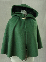 Cloak:2092, Cloak Style:Fuller Half Circle Short, Cloak Color:Forest Green, Fiber / Weave:100% Wool Melton, Cloak Clasp:Plain Rope<br>Hook & Eye, Hood Lining:Black Cotton Velvet, Back Length:26", Neck Length:17", Seasons:Winter, Fall, Spring, Note:This short cloak is a fuller half circle.<br>The smaller neck makes this a good choice for a child or small person.<br>It is made from a deep green wool melton<br>
finished with a silvertone Plain Rope hook and eye clasp.<br>The hood, lined with black cotton velvet, adds a dash of elegance..