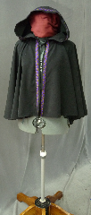 Cloak:2145, Cloak Style:Full Circle Short Cloak with trim, Cloak Color:Black with Celtic Knot Purple/Amber on Black Trim, Fiber / Weave:Sueded Polyester, water resistant, Hood Lining:Unlined, Back Length:23", Neck Length:21", Seasons:Summer, Note:Lightweight and decorative, with some water resistance,<br>this unlined cloak makes a great accessory for LARP or Renaissance Fair.<br>The cloak is machine washable and easy care,<br>but avoid exposure to velcro as it could snag the trim..