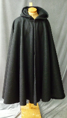 Cloak:2203, Cloak Style:Full Circle Cloak, Cloak Color:Black, Fiber / Weave:32 oz. Wool Melton Extra Heavy, Hood Lining:Unlined, Back Length:50.5", Neck Length:27", Seasons:Winter, Note:32 ounce wool is so thick it's like wearing your own room!<br>Wind resistant, water resistant and durable,<br>this cloak will stand up to winter weather.<br>Dry Clean only..
