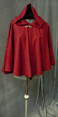 Cloak:2290, Cloak Style:Full Circle Short Cloak, Cloak Color:Rusty red with a slight grey heather., Fiber / Weave:Wool gabardine with a bit of lycra, Cloak Clasp:Bavarian - Silvertone, Hood Lining:Unlined, Back Length:28", Neck Length:23", Seasons:Spring, Fall, Summer, Note:This soft and fluid washable wool blend cloak is great for warmer days<br> and climates. Closes with a pewter Bavarian hook-and-eye clasp..