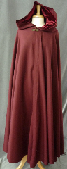 Cloak:2360, Cloak Style:Full Circle Cloak, Cloak Color:Cranberry Red, Fiber / Weave:Wool Gabardine, Cloak Clasp:Bavarian - Bronzetone, Hood Lining:Deep Red Rayon Acetate Velvet, Back Length:57", Neck Length:22", Seasons:Fall, Spring, Note:This beautiful  cloak  is a great balance of luxury and value!<br>The cloak is made of 100% wool gabardine and <br>features a dramatic full-sized hood is lined in a stunning<br>maroon washed velvet, for even more elegance.<br>Finished with a lovely bronze tone bavarian style hook-and-eye clasp.<br>Dry Clean only..