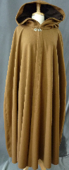 Cloak:2361, Cloak Style:Shaped Shoulder, Cloak Color:Cafe au Lait Brown, Fiber / Weave:100% wool melton, felted and brushed, Cloak Clasp:Vale - Goldtone, Hood Lining:Dark Brown Cotton Velveteen, Back Length:53", Neck Length:25", Seasons:Winter, Fall, Spring, Note:Made in a very neutral light golden brown,<br>this shaped shoulder cloak is made from a felted wool<br>thick enough to have some wind and water resistance.<br>Seams can be opened to create arm slits.<br>Sturdy and durable, this cloak will stand up to winter weather.<br>Dry Clean only..