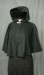 Cloak:2375, Cloak Style:Fuller Half Circle Child's, Cloak Color:Black, Fiber / Weave:Light weight economy fleece, Cloak Clasp:Fleur de Lis, Hood Lining:Unlined, Back Length:20.5", Neck Length:21", Seasons:Fall, Spring, Note:Lightweight economy fleece provides a warmth<br>with very little weight - easily tolerated by small children.<br>Suitable for indoor wear,  late spring,  early fall,<br>or cool summer evenings..