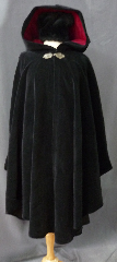 Cloak:2391, Cloak Style:Cape / Ruana, Cloak Color:Black, Fiber / Weave:Cotton Velvet, washed, Cloak Clasp:Shadbury Leaf - Silvertone, Hood Lining:Burgundy Cotton Velveteen, Back Length:45", Neck Length:21", Seasons:Winter, Fall, Spring, Note:This cloak was created from thick rich<br>washed cotton upholstery velvet.<br>Thicker than many wool coatings,<br>this velvet cloak provides significant warmth and wind resistance.<br> A pewter Triple Medallion clasp provides the finishing touch.<br>Machine wash low, gentle, tumble dry low..