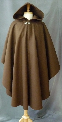 Cloak:2395, Cloak Style:Cape / Ruana, Cloak Color:Brown, Fiber / Weave:100% wool melton, felted medium weight, Cloak Clasp:Vale, Hood Lining:Unlined, Back Length:44", Neck Length:21", Seasons:Southern Winter, Fall, Spring, Note:This medium brown, cape ruana is made from a felted<br>wool thick enough to have some  wind and water resistance.<br>Sturdy and durable, this cloak will stand up to mild winter<br>weather.  Dry Clean only..