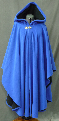 Cloak:2567, Cloak Style:Cape / Ruana extra long (30") over the shoulder, Cloak Color:Royal Blue / Black 2 toned, Fiber / Weave:Windblock Polar Fleece, Cloak Clasp:Triple Medallion, Hood Lining:Self-lining, Back Length:48", Neck Length:24", Seasons:Winter, Fall, Spring, Note:A cross between a cape and a cloak, a ruana<br>is a great way to keep warm while<br>frequent, unhindered use of your arms <br>is needed. Ruanas make great driving cloaks!<br>This one is made from windblock polar fleece<br> which is both wind proof and water resistant.<br>Machine washable on gentle and tumble dry low inside out..