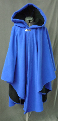 Cloak:2573, Cloak Style:Cape / Ruana extra long (30") over the shoulder, Cloak Color:Royal Blue / Black 2 toned, Fiber / Weave:Windblock Polar Fleece, Cloak Clasp:Vale, Hood Lining:Self-lining, Back Length:43", Neck Length:22", Seasons:Winter, Fall, Spring, Note:A cross between a cape and a cloak, a ruana<br>is a great way to keep warm while<br>frequent, unhindered use of your arms <br>is needed. Ruanas make great driving cloaks!<br>This one is made from windblock polar fleece<br> which is both wind proof and water resistant.<br>Machine washable on gentle and tumble dry low inside out..