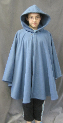 Cloak:2604, Cloak Style:Cape / Ruana extra long (31") over the shoulder, Cloak Color:Colonial Blue, Fiber / Weave:WindPro Herringbone Fleece (wool-like exterior), Cloak Clasp:Plain Rope<br>Hook & Eye, Hood Lining:Self-lining, Back Length:33", Neck Length:25", Seasons:Fall, Spring, Southern Winter, Winter, Note:Luxurious, functional, and economically friendly!<br>This windpro cloak blocks more wind than a basic fleece<br>and has a water-repelling outer finish! It's perfect<br>for New England winters and cold, rainy, windy climates.<br>The inside of the fabric wicks up moisture keeping you dry and warm.<br>Machine washable cold gentle, tumble dry low<br> Throw it on and go!<br>Note, the model is 4' 10".