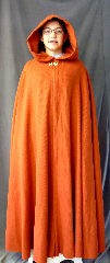 Cloak:2651, Cloak Style:Full Circle Cloak, Cloak Color:Burnt Orange, Fiber / Weave:Wool Blend Coating Ribbed, Cloak Clasp:Vale - Goldtone, Hood Lining:Unlined, Back Length:55", Neck Length:20.5", Seasons:Summer, Spring, Fall.
