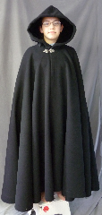 Cloak:2652, Cloak Style:Full Circle Cloak, Cloak Color:Black, Fiber / Weave:Very Heavy Wool Melton with Brushed Finish, Cloak Clasp:Triple Medallion, Hood Lining:Black Silk Velvet, Back Length:52", Neck Length:20.5", Seasons:Winter.