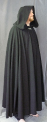Cloak:3043, Cloak Style:Full Circle Cloak, Cloak Color:Black, Fiber / Weave:80% Wool / 20% Nylon, Cloak Clasp:Vale, Hood Lining:Unlined, Back Length:53", Neck Length:24.5", Seasons:Fall, Spring, Note:This black full circle cloak<br>has a slightly rougher texture<br>with a classic look.<br>Perfect for cooler evenings<br>and accented with a silvertone<br>Vale hook-and-eye clasp.<br>Dry clean only.<br>Slight discoloration<br>on left front panel..