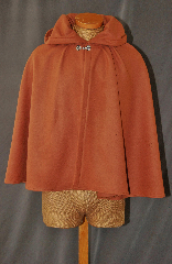 Cloak:2753, Cloak Style:Full Circle Short Cloak, Cloak Color:Golden Brown / Caramel, Fiber / Weave:100% Wool, Cloak Clasp:Vale - Goldtone, Hood Lining:Unlined, Back Length:24", Neck Length:21", Seasons:Winter, Fall, Spring, Note:This short full circle cloak is perfect<br>
for a child or adult.<br>Made from a Caramel wool,<br>this midweight cloak is soft.<br>Features an unlined hood,<br>finished off with a Goldtone<br>Vale hook-and-eye clasp.<br>Dry Clean only.
