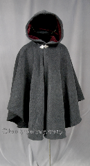 Cloak:2773, Cloak Style:Cape / Ruana extra long over the shoulder, Cloak Color:Grey and Black, Fiber / Weave:Plush 100% Wool Melton with Herringbone Pattern, Cloak Clasp:Triple Medallion, Hood Lining:Burgundy Velvet Lining, Back Length:37", Neck Length:23", Seasons:Winter, Fall, Spring, Note:This gorgeous Plush Wool Melton cloak<br>with
herringbone Pattern<br>has a lovely Scottish Irish look.<br>A cross between a cape and a cloak,<br>a ruana is a great way to keep warm when<br>frequent, unhindered use of your arms is needed.<br>Ruanas make great driving cloaks!<br>Dry Clean only..