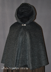 Cloak:2846, Cloak Style:Shaped Shoulder Cloak - Short, Cloak Color:Grey, Fiber / Weave:80% Wool / 20% Nylon, Cloak Clasp:Alpine Knot - Goldtone, Hood Lining:Unlined, Back Length:28", Neck Length:19", Seasons:Spring, Fall, Southern Winter, Winter, Note:Warm and soft this Grey wool blend<br>short cloak is long enough to protect<br>an adult torso or child from cool evenings<br>Dry clean only..