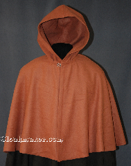 Cloak:2859, Cloak Style:Shaped Shoulder Cloak - Short, Cloak Color:Caramel, Fiber / Weave:80% Wool / 20% Nylon, Cloak Clasp:Plain Rope<br>Hook & Eye, Hood Lining:Unlined, Back Length:22", Neck Length:20", Seasons:Spring, Fall, Southern Winter, Winter, Note:Made from a Caramel wool,<br>this mid-weight cloak is soft.<br>It features an unlined hood,<br>and is finished off with a<br>silver tone plain rope hook<br>and eye clasp.<br>Perfect for a child or adult.<br>Dry clean only..