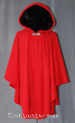Cloak:2927, Cloak Style:Cape / Ruana, Cloak Color:Red, Fiber / Weave:80% Wool / 20% Nylon BrokenTwill Weave, Cloak Clasp:Gothic Heart, Hood Lining:Black Velvet, Back Length:40", Neck Length:21", Seasons:Fall, Spring, Southern Winter, Note:This gorgeous wool blend<br>broken twill weave cloak<br>is a fun touch for those cool<br>evenings outdoor events.<br>A cross between a cape and a cloak,<br>a ruana is a great way to keep warm<br>while frequent, unhindered use of<br>your arms is needed.<br>With a hood lined in a soft<br>black velvet accented with a<br>gothic heart hook-and-eye clasp.<br>Dry clean only.