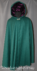 Cloak:2932, Cloak Style:Full Circle Cloak, Cloak Color:Jewel Green, Fiber / Weave:Washed Wool Flannel, Cloak Clasp:Vale, Hood Lining:Purple Velvet, Back Length:42.5", Neck Length:22.5", Seasons:Fall, Spring, Note:Made of lightweight washed wool flannel<br>this vibrant green full circle cloak<br>is ideal for outings on cool evenings.<br>Lined with a complementing<br>purple hood for a punch of color.<br>Can be hemmed to height<br>Dry clean only..