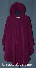 Cloak:3101, Cloak Style:Shaped Shoulder Ruana Cloak, Cloak Color:Fuschia / Dark Orchid, Fiber / Weave:Windpro Fleece, Cloak Clasp:Triple Medallion, Hood Lining:Self-lining, Back Length:39", Neck Length:21", Seasons:Winter, Fall, Spring, Note:Warm and cozy this lightweight<br>shaped shoulder ruana<br>windpro fleece cloak is<br>perfect for cold evenings.<br>A cross between a cape and a cloak,<br>a ruana is a great way to keep warm<br>while frequent, unhindered use of<br>your arms is needed.<br>With an overarm of 31" this cloak<br>has less bulk than a<br>traditional Ruana and<br>makes a great driving cloak!<br>Machine washable..
