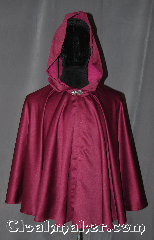 Cloak:3120, Cloak Style:Full Circle Cloak, Cloak Color:Maroon, Fiber / Weave:polyester satin, Cloak Clasp:Sissel Pewter, Hood Lining:Purple Crushed Velvet, Back Length:26.5", Neck Length:21", Seasons:Spring, Fall, Note:A luxurious, sophisticated<br>Polyester satin short cloak<br>with moleskin backing<br>Adorned with a Sissel Pewter<br>hook and eye clasp.<br>Machine washable line dry..