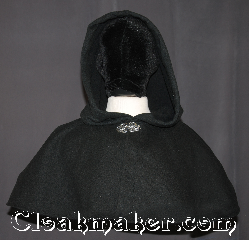 Cloak:3122, Cloak Style:Shaped Shoulder-Short, Cloak Color:Black, Fiber / Weave:Windpro herringbone Polar Fleece, Cloak Clasp:Vale, Hood Lining:Unlined, Back Length:11", Neck Length:19", Seasons:Fall, Spring, Southern Winter, Note:A wonderful starter cloak for a<br>child or adult.<br>This black windpro polar fleece<br>with a felted interior<br>is warm enough for most winters<br>Sized for play and walking.<br>Water resistant<br>  Machine washable..