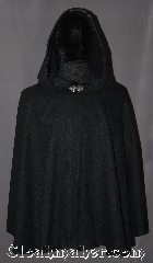 Cloak:3157, Cloak Style:Shaped Shoulder Ruana Cloak, Cloak Color:Navy Blue almost Black<br>peacock and royal blue heather<br>(slightly scratchy), Fiber / Weave:Wool Blend, Cloak Clasp:Vale, Hood Lining:unlined with black ribbon trim, Back Length:24.5", Neck Length:23", Seasons:Fall, Spring, Note:The pictures do not do this<br>shape shoulder cloak justice.<br>Made from a gorgeous,<br>slightly scratchy, navy blue<br> wool blend heathered with<br>jewel tone blues and greens <br>The front interior is trimmed with<br>black ribbon and adorned with<br>a classic vale hook-and-eye clasp.<br>Dry Clean Only..