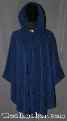 Cloak:3165, Cloak Style:Cape / Ruana, Cloak Color:Egyptian Blue, Fiber / Weave:Windbloc Fleece, Cloak Clasp:Vale, Hood Lining:Self-lining, Back Length:41" back<br>28" overarm, Neck Length:20.5", Seasons:Winter, Fall, Spring, Note:Made of Windbloc Fleece<br>(a thick plush material that is<br>warm and windproof)<br>this cloak is perfect for cold winters.<br>The Ruana shape with  shortened<br>sides allows easy arm access for<br>everyday activities.  The cloak is competed<br>with a silver tone Vale hook.