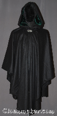Cloak:3237, Cloak Style:Ruana, Cloak Color:Black, Fiber / Weave:Wool Cashmere, Cloak Clasp:Vale, Hood Lining:Hunter Green velvet, Back Length:44" back<br>25" sides, Neck Length:22", Seasons:Fall, Spring, Note:Luxuriously soft this black ruana cloak with a<br>dark green velvet lining with shortened<br>sides allowing for a a wide range<br>of movement with no drafts.<br>Perfect for driving on cold winter days<br>this cloak is made of a light weight<br>wool cashmere blend,<br>Accented with a Silver tone<br>vale hook-and-eye clasp.<br>Dry Clean only..