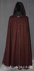 Cloak:3240, Cloak Style:Full Circle Cloak, Cloak Color:Crimson Red / Black  stripe, Fiber / Weave:wool poly acrylic blend, Cloak Clasp:Vale, Hood Lining:Unlined, fabric is<br>darker on the inside, Back Length:54", Neck Length:24", Seasons:Fall, Spring, Southern Winter, Note:This one of a kind crimson and black<br>diagonal striped full circle cloak<br>is a great finish to a night<br>on the town or Renaissance Fair<br>providing warmth with a unique pattern.<br>Made from a discontinued wool blend<br>coating double sided fabric<br>with a black inside.<br>Perfect for Summer, Late Spring,<br>Early Fall outerwear.<br>Finished with a vale hook-and-eye clasp.<br>Dry or spot clean only..