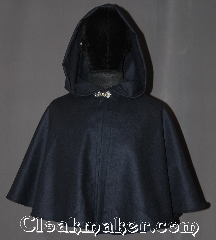 Cloak:3250, Cloak Style:Capelet, Cloak Color:Navy Blue, Fiber / Weave:Wool Twill Suiting, Cloak Clasp:Stina Pewter, Hood Lining:Unlined, Back Length:19", Neck Length:18", Seasons:Fall, Spring, Note:A perfect short capelet for a starter cloak<br>or formal evening during cold receptions.<br>Made of a navy wool blend twill suiting<br>and adorned with an<br>elegant stina pewter clasp.<br>Dry or spot clean only..