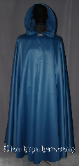 Cloak:3271, Cloak Style:Full Circle Cloak Rain Cloak, Cloak Color:Teal Blue shimmer, Fiber / Weave:100% Polyester, Cloak Clasp:Vale, Hood Lining:Unlined, Back Length:54", Neck Length:21", Seasons:Fall, Spring, Summer, Note:A bright fun rain cloak that feels<br>like fabric, moves like fabric<br>what more could you ask for?<br>Also protects from the rain and mud!<br>Can be warn with winter clothes<br>underneath for added warmth.<br>Machine washable..