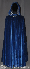 Cloak:3279, Cloak Style:Full Circle Cloak, Cloak Color:Royal Blue, Fiber / Weave:Cotton Velvet, Cloak Clasp:Triple Medallion, Hood Lining:Silver silk velvet, Back Length:52", Neck Length:20", Seasons:Southern Winter, Fall, Spring, Note:A gorgeous soft royal blue <br>full circle cloak is the<br>ideal piece for any king or queen.<br>Accented with a shimmer silver<br>velvet hood lining for a luxurious feel<br>and triple medallion clasp.<br>Easy care machine washable<br>Throw it on and go!.