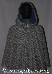 Cloak:3280, Cloak Style:Full Circle Short Cloak, Cloak Color:Two tone Grey woven, Fiber / Weave:100% Lambs Wool, Cloak Clasp:Vale, Hood Lining:Navy blue Rayon velvet, Back Length:28", Neck Length:22.5", Seasons:Spring, Fall, Southern Winter, Note:A super soft two tone grey<br>100% lambs wool weave<br>short full circle cloak is the<br>perfect starter cloak for any age.<br>Short enough for a child<br>to play and grow with while allowing<br>an adult ease of arm use during<br>everyday activities.<br>The soft navy blue velvet hood lining<br>and pewter vale clasp adds a touch of<br>elegance with added warmth and security.<br>Spot or dryclean only..