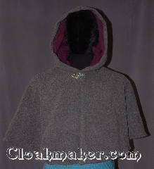 Cloak:3293, Cloak Style:Shaped Shoulder<br>Short Cloak With pockets, Cloak Color:Grey Heather, Fiber / Weave:100% Lamb Wool, Cloak Clasp:Vale, Hood Lining:Wine purple Velvet, Back Length:19", Neck Length:22", Seasons:Winter, Southern Winter, Fall, Spring, Note:A perfect short shape shoulder capelet<br>for a starter cloak or formal evening<br>during cold receptions.<br>Made of warm grey heathered lambs wool<br>and wine cotton velveteen hood lining<br>with a elegant vale pewter clasp.<br>Spot or dry clean only.