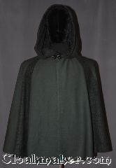 Cloak:3295, Cloak Style:3/4 Circle "Pieced" with Lirepipe, Cloak Color:Green two tone, Fiber / Weave:Wool blend suiting, and  Wool blend weave.<br>80% wool 20% nylon, Cloak Clasp:Vale (black enamel), Hood Lining:Unlined, with 49" lirapipe, Back Length:28", Neck Length:19", Seasons:Fall, Spring, Note:Young rangers and woodland folk will adore<br>this 3/4 circle lirepipe pieced cloak.<br>Made from two different wools<br>a gabardine suiting and two side panels<br>and matching hood made of a<br>black and green wool weave.<br>A lirepipe is both useful and fashionable<br>when you wrap the elongated hood<br>around your neck in windy weather.<br>Spot or dryclean only..