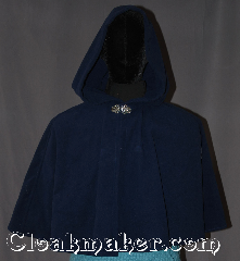 Cloak:3297, Cloak Style:Shaped Shoulder-Short, Cloak Color:Navy Blue, Fiber / Weave:Windblock Polar Fleece, Cloak Clasp:Vale, Hood Lining:Unlined, Back Length:20", Neck Length:19", Seasons:Winter, Southern Winter, Fall,Spring, Note:Made of Windbloc Fleece (a thick<br>plush material that is warm and windproof)<br> This warm and beautiful navy blue cloak <br>is perfect for cold winter months<br>the 19" neck is suitable for youth to<br>young adult and will grow with your child<br>Finished with a sturdy pewter<br>Triple Medallion hook-and-eye clasp..