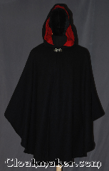 Cloak:3313, Cloak Style:Shaped Shoulder Ruana Cloak, Cloak Color:Black, Fiber / Weave:100% Wool Melton, Cloak Clasp:Vale, Hood Lining:Red moleskin, Back Length:40.5", Neck Length:20.75", Seasons:Winter, Southern Winter, Fall, Spring, Note:Made with 100% wool this<br>shaped shoulder ruana cloak<br>with a hood lined in red moleskin<br>makes a great accessory for everyday wear,<br> LARP or Renaissance Fair.<br>An elegant cross between a cape and a cloak,<br>a ruana is a great way to keep warm<br>while frequent, unhindered use of<br>your arms is needed.<br>Ruanas make great driving cloaks!<br>Spot or dry clean only..