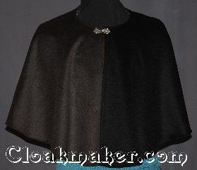 Cloak:3320, Cloak Style:Shaped Shoulder Parti Cloak<br>Hoodless, Cloak Color:Black Brown, Fiber / Weave:Brushed wool cashmere blend, Cloak Clasp:Stina Pewter, Hood Lining:N/A, Back Length:22", Neck Length:25.5", Seasons:Winter, Southern Winter, Fall, Spring, Note:A classic black and brown collared mi-parti<br>or parti-coloured is a cloak made of two<br>contrasting fabrics, one on each side.<br>Especially popular at the<br>English mid-century court;<br>this eye-catching cloak is a<br>garment for any occasion.<br>Made of a long pile 100% wool<br>you will love to pet.<br>Dry or spot clean only..