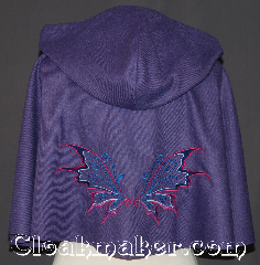 Cloak:3343, Cloak Style:Shaped Shoulder-Short, Cloak Color:Purple heathered<br> Embroidered butterfly, Fiber / Weave:Wool Blend, Cloak Clasp:Antiquity, Hood Lining:Unlined, Back Length:17.5", Neck Length:20", Seasons:Fall, Spring, Note:"Butterflies are self propelled flowers."<br>? Robert A. Heinlein<br>For a dazzling addition to your wardrobe,<br>try this eye catching  embroidered<br>shape shoulder capelet. <br>A fun and dramatic wool blend<br>purple heathered cloak is decorated<br>with pink, purple and blue<br>butterfly wings and an antique<br>silver-tone antiquity hook-and-eye clasp.<br> For a little magic in your day.<br>Dry Clean Only..