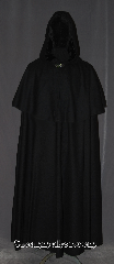 Cloak:3361, Cloak Style:Highwayman Shaped Shoulder Cloak<br>with arm slits and Mantle, Cloak Color:Black, Fiber / Weave:100% Wool, Cloak Clasp:Vale, Hood Lining:Black Velvet, Back Length:54.5", Neck Length:22", Seasons:Fall, Spring, Southern Winter, Note:"And the highwayman came riding-<br>Riding -riding - The highwayman came riding"<br>Alfred Noyes<br>
 This mid-weight cloak is a great way to<br> bring a touch of drama and sophistication<br> to your cold weather wardrobe.<br> Luxurious 100% wool twill,<br>while the coachman / highwayman styling<br>adds a little extra flare for the eye.<br>With arm slits for controlling your steed<br>and a classic mantle for added warmth.<br>The generously-sized hood features a<br>stunning deep black velvet lining. <br>Finished with a vale hook and eye clasp.<br>Dry clean only.