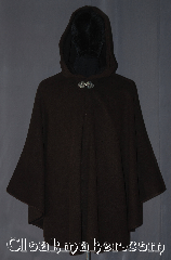 Cloak:3373, Cloak Style:Shaped Shoulder Ruana Cloak, Cloak Color:Heathered Chocolate Brown, Fiber / Weave:80% Wool / 20% Nylon, Cloak Clasp:Triple Medallion, Hood Lining:Unlined dark brown interior double sided fabric, Back Length:33" back<br>27" side, Neck Length:21", Seasons:Southern Winter, Fall, Spring, Note:This heathered chocolate brown<br>shape shoulder ruana is made with a<br>lovely dark interior for a classic look.<br>This cloak is made of a Wool blend with a<br>silvertone triple medallion hook and eye clasp<br>A cross between a cape and a cloak,<br>a ruana is a great way to keep warm<br>while frequent, unhindered use<br>of your arms is needed.<br>Ruanas make great driving cloaks!<br>Dry clean only..