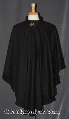 Cloak:3392, Cloak Style:Ruana Cloak<br>Casco Bay inspired, Cloak Color:Black, Fiber / Weave:Wool Blend Suiting, Cloak Clasp:Vale, Hood Lining:N/A, Back Length:40"<br>23.5" overarm, Neck Length:21", Seasons:Fall, Spring, Southern Winter, Note:Warm enough for new england leaf peeping.<br>A cross between a cape and a cloak,<br>a ruana is a great way to keep warm<br>while frequent, unhindered use of<br>your arms is needed.<br>This black collared ruana cloak<br>is not as soft as our other cloaks<br>with a slight classic wool feel that<br>may soften with wear.<br>Adorned with a vale hook and eye clasp<br> Ruanas make great driving cloaks!<br>Machine washable.