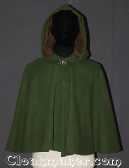 Cloak:3448, Cloak Style:Shaped Shoulder-Short, Cloak Color:Green, Fiber / Weave:80% Wool / 20% Nylon cashmere blend, Cloak Clasp:Vale, Hood Lining:Brown Faux Suede, Back Length:24", Neck Length:20", Seasons:Southern Winter, Fall, Spring, Note:With a lavish feel all over, this soft<br>sage green short shape shoulder cloak<br>will get you complements<br>everywhere you go.<br>The cloak is made of a wool nylon<br>cashmere blend accented with<br>a soft brown lined faux suede hood,<br>and gold tone triple medallion<br>hook and eye clasp.<br> Perfect for a child to grow with<br> or a light shrug for<br>a night on the town<br>Spot or dry clean only..